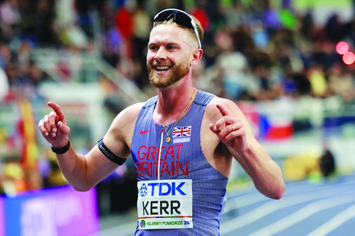 Britain's Josh Kerr celebrates winning the men's 3000m final during the World Athletics Indoor Championships Kujawy Pomorze 2026 in Torun, Poland on March 21, 2026. (AFP)
