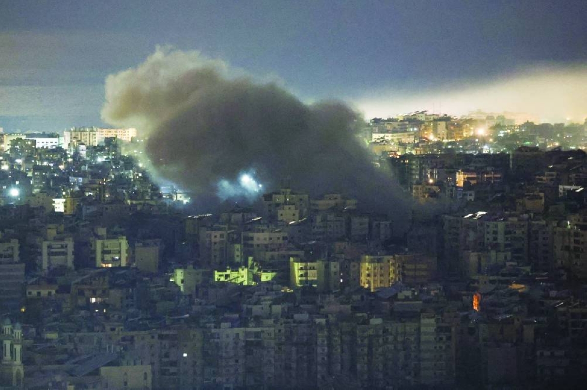Smoke rises from Beirut’s southern suburbs following an Israeli strike, after an escalation between Hezbollah and Israel, amid the US-Israeli conflict with Iran, in Lebanon, Monday. (Reuters)