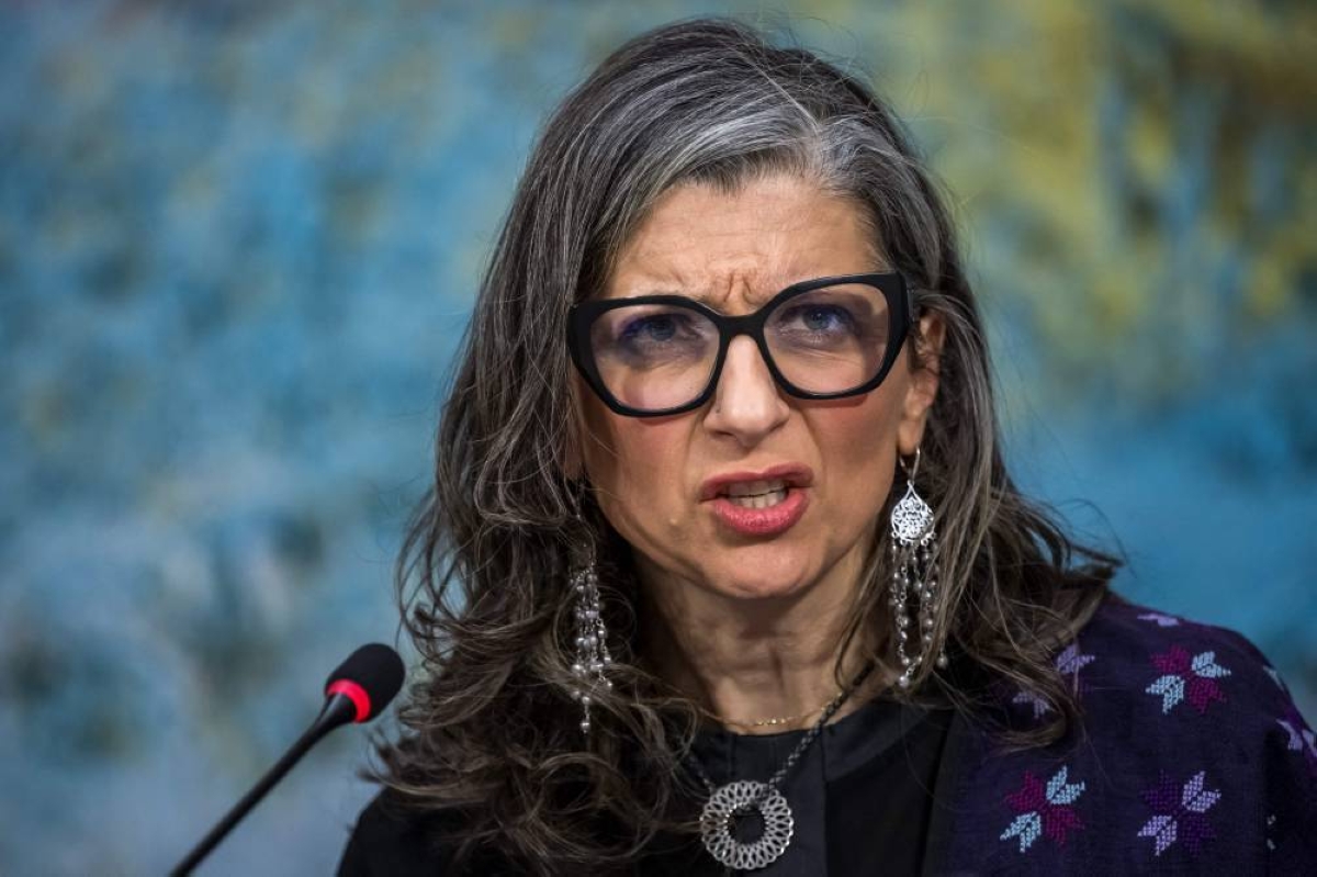 UN special rapporteur on the occupied Palestinian territories Francesca Albanese presents her latest report before delegates at the UN Rights Council, in Geneva, yesterday. (AFP)
