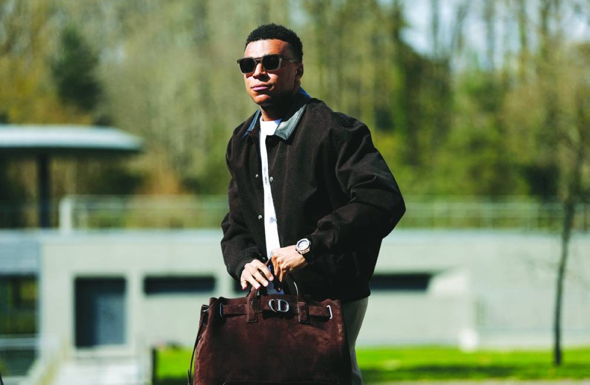 France's Kylian Mbappe arrives before training. REUTERS