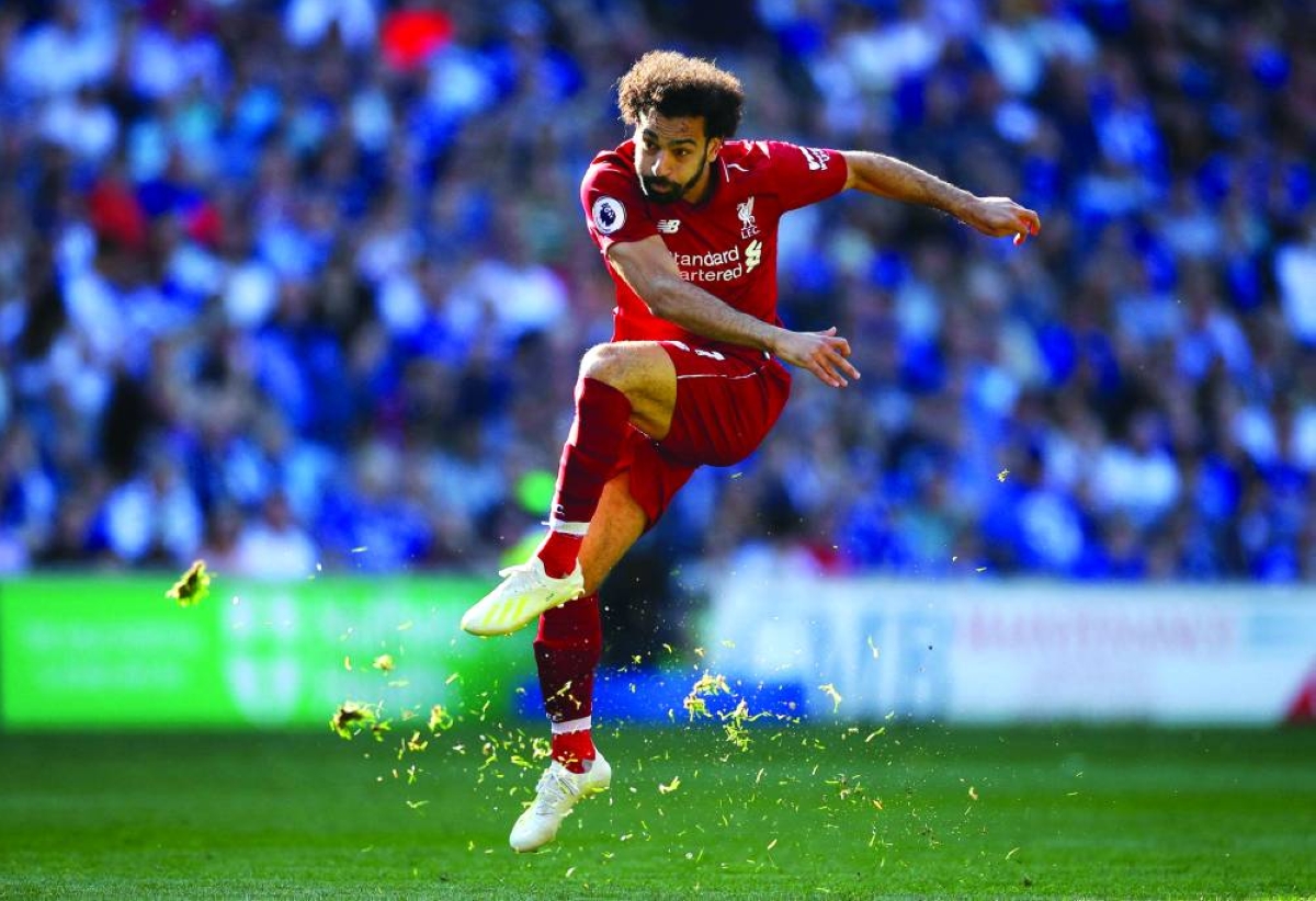Soccer Football - Premier League - Cardiff City v Liverpool - Cardiff City Stadium, Cardiff, Britain - April 21, 2019   Liverpool's Mohamed Salah shoots at goal. Reuters