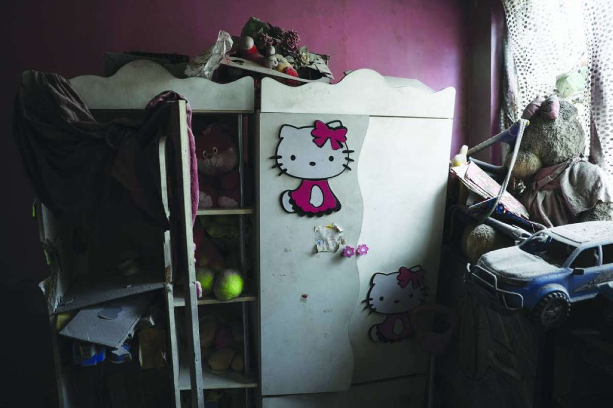 Belongings and furniture inside a residential building in Tehran that was damaged in an air strike. – Reuters