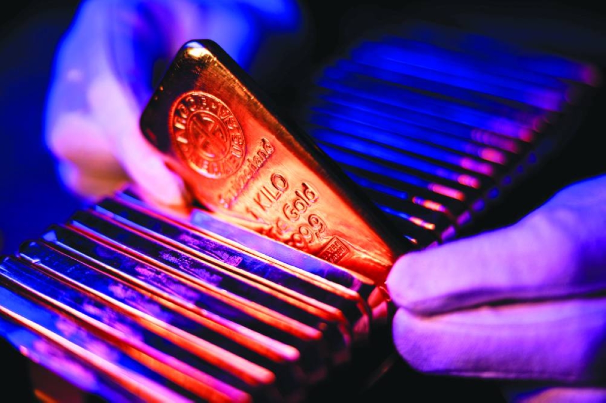 Opportunistic buyers are starting to emerge in the gold market after the biggest selloff in years, helping to keep bullion’s record-breaking three-year bull run intact