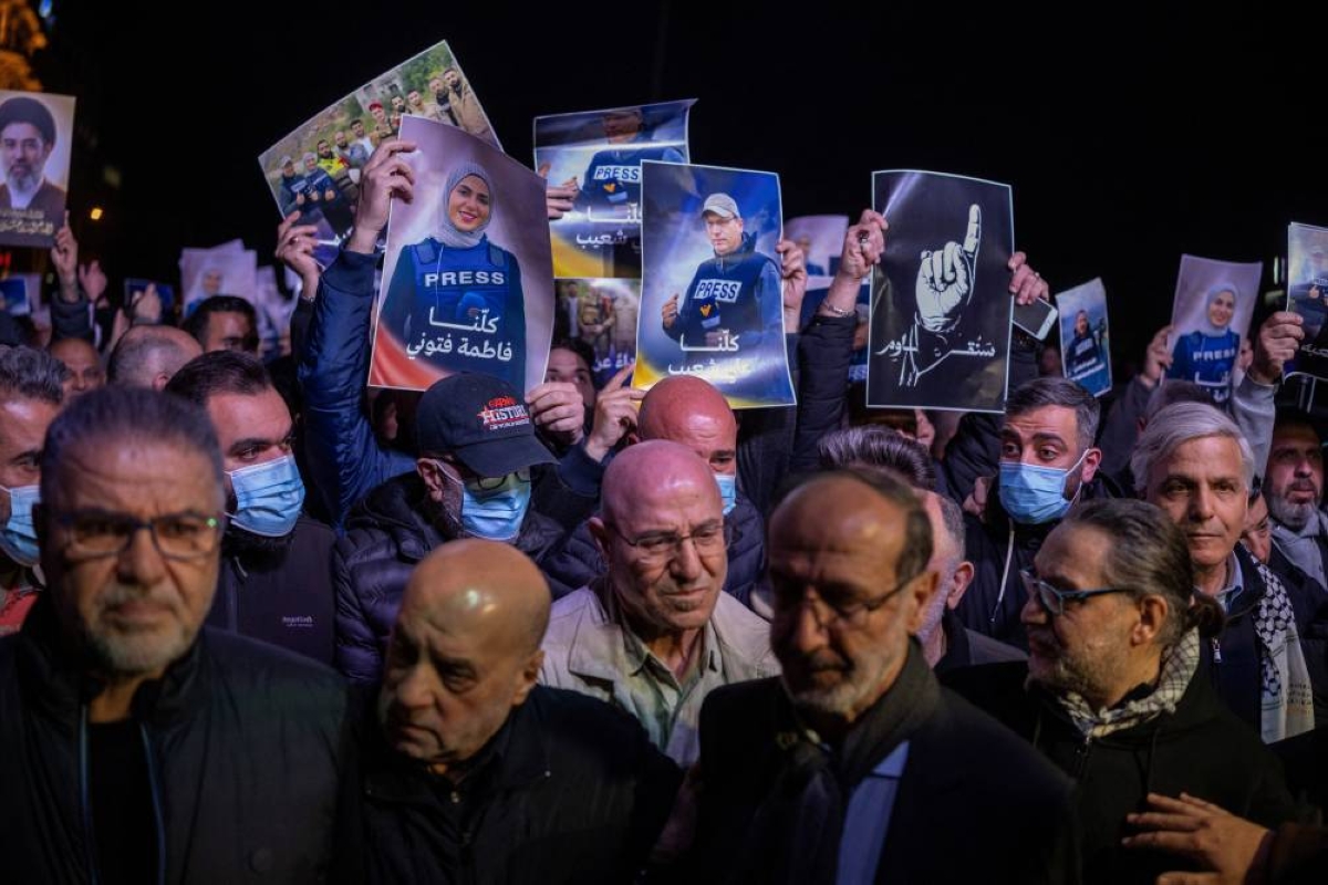 People take part in a demonstration following the killing of Lebanese journalists, Al Manar reporter Ali Shaib, Al Mayadeen reporter Fatima Ftouni and cameraman Mohammed Ftouni by a targeted Israeli strike, amid escalating hostilities between Israel and Hezbollah, as the U.S.-Israeli conflict with Iran continues, in Beirut, Lebanon, March 28, 2026. REUTERS/Alkis Konstantinidis