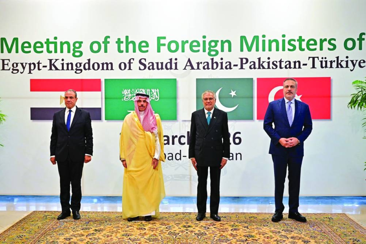 Pakistan's FM Ishaq Dar (second right) with his counterparts, Turkiye's Hakan Fidan (right), Saudi Arabia's Faisal bin Farhan (second left), and Egypt's Badr Abdelatty, at the Foreign Office in Islamabad Sunday. (AFP)