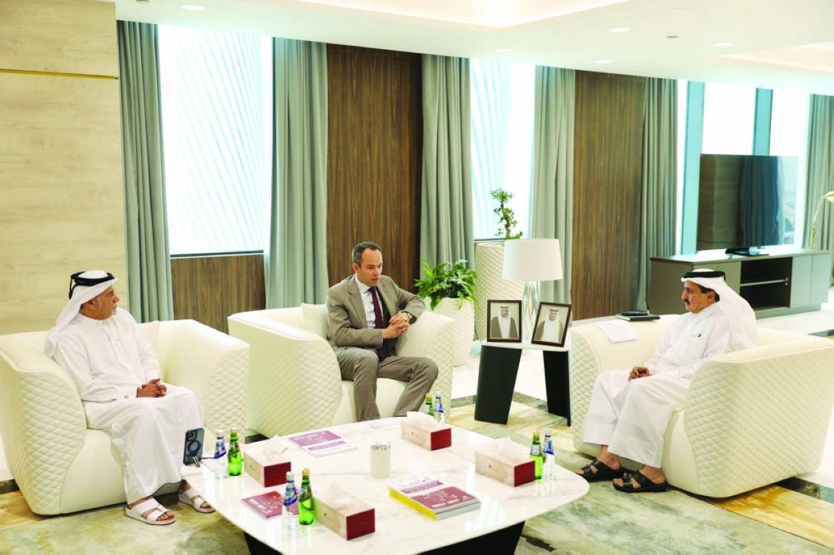 Belgian ambassador Eugene Krens in a discussion with Qatar Chamber chairman Sheikh Khalifa bin Jassim al-Thani, while Qatar Chamber board member Mohamed bin Ahmed al-Obaidli looks on.