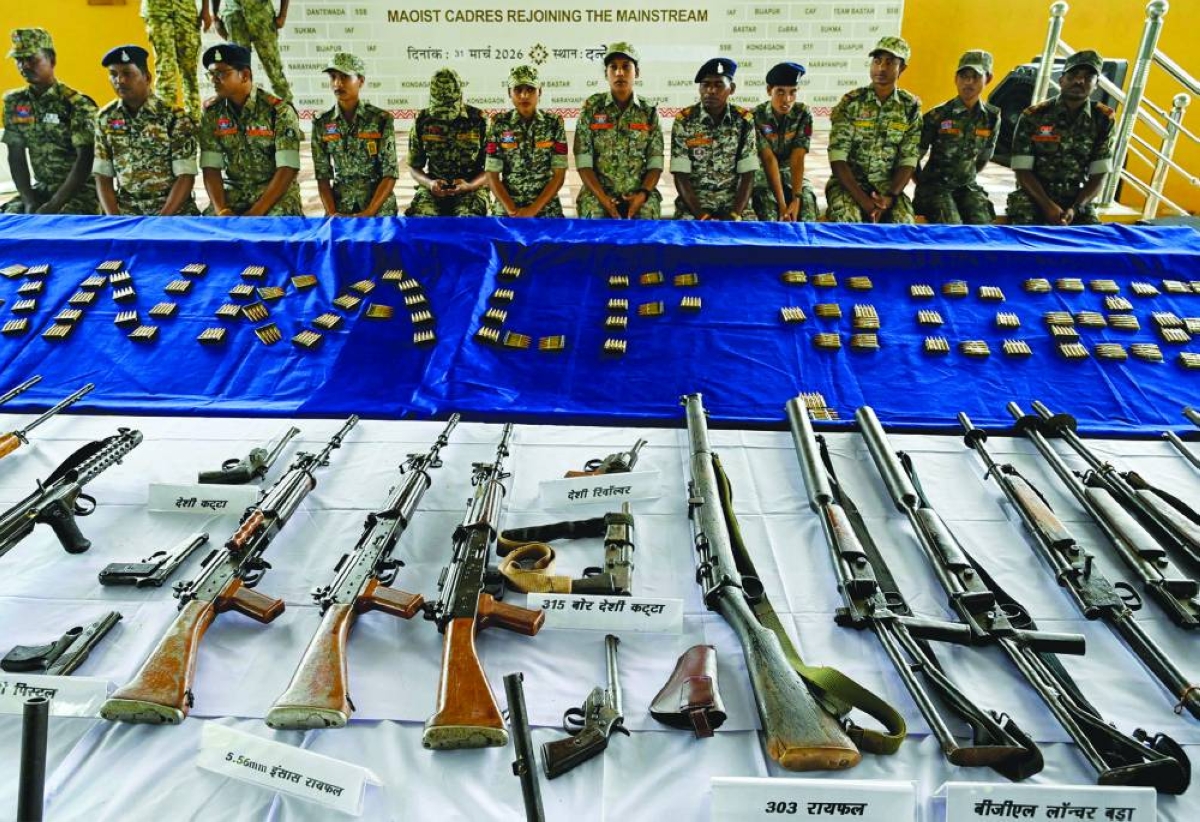 Weapons seized from Maoist rebels and fighters upon their surrender are displayed at a police facility in Dantewada in Chhattisgarh state's Bastar division Tuesday. (AFP)