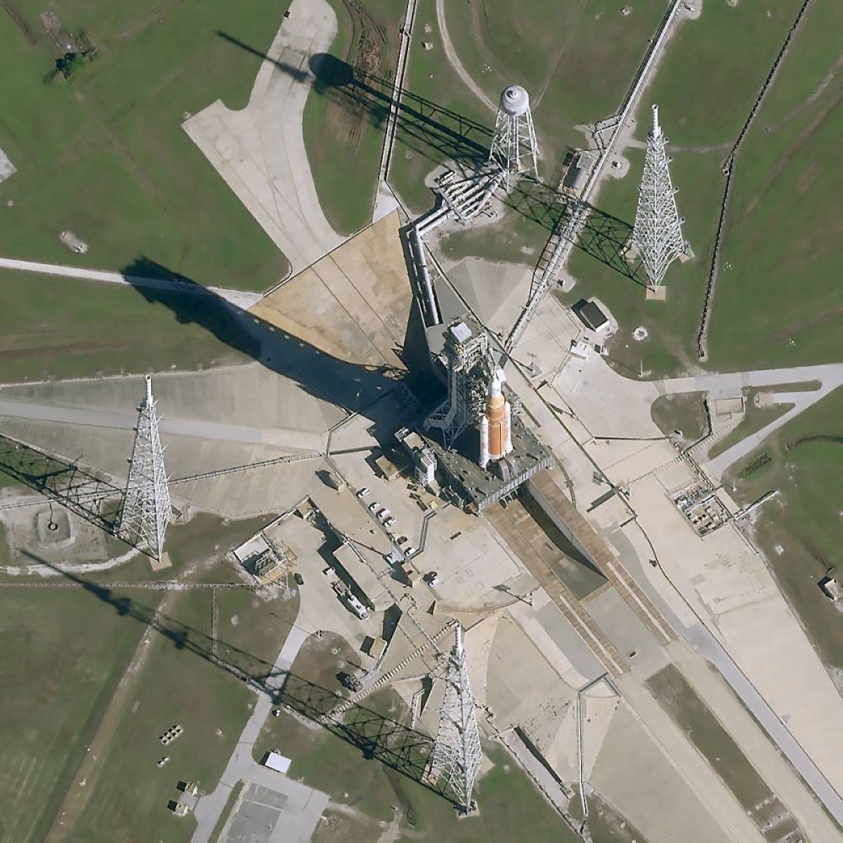 SLS rocket with Orion ESM at its launch pad at Kennedy Space Center for its upcoming launch of the Artemis II mission. Pléiades Neo image.