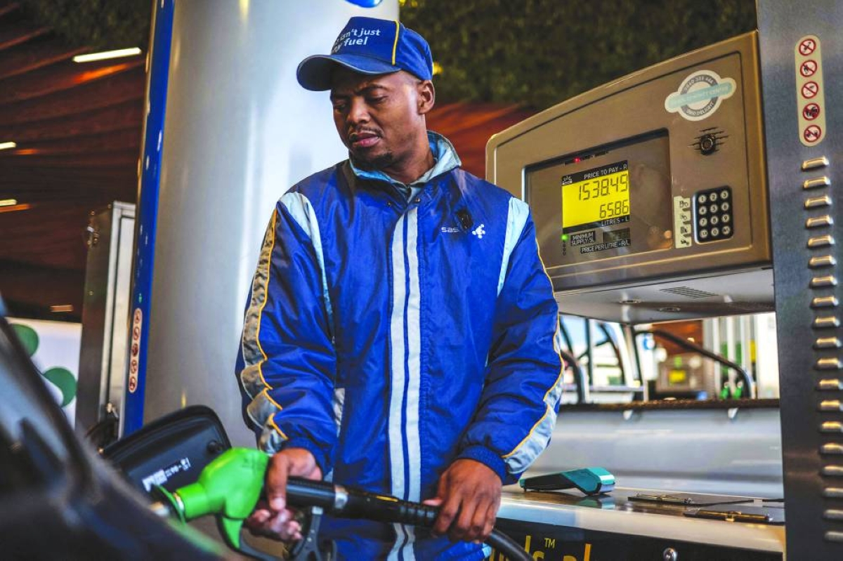 A vehicle is refuelled at a petrol station in Rosebank, Johannesburg Wednesday, a day after South Africa lowered its fuel tax for a month to offset a global oil price surge driven by the Iran war, even as pump prices rose in one of the steepest increases on record. (AFP)