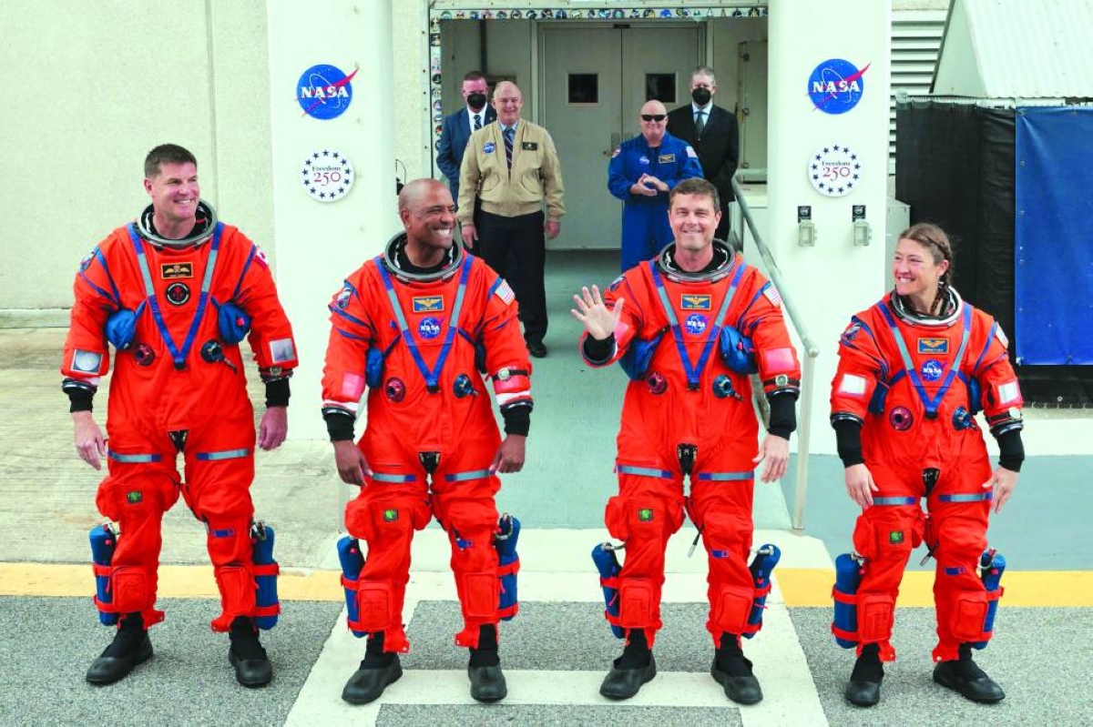 From left: Mission specialist Jeremy Hansen of Canadian Space Agency, pilot Victor Glover, commander Reid Wiseman and mission specialist Christina Koch walk out of the Neil A. Armstrong Operations and Checkout Building ahead of the launch of the Artemis II at Nasa’s Kennedy Space Center Wednesday. (AFP)