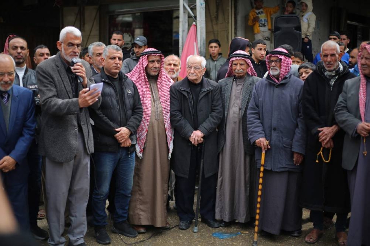 Palestinian demonstrators gather at the Bureij refugee camp, in central Gaza Strip, yesterday, during a protest against the Israeli parliament's approval of a new death penalty bill for Palestinians convicted of deadly attacks. (AFP)