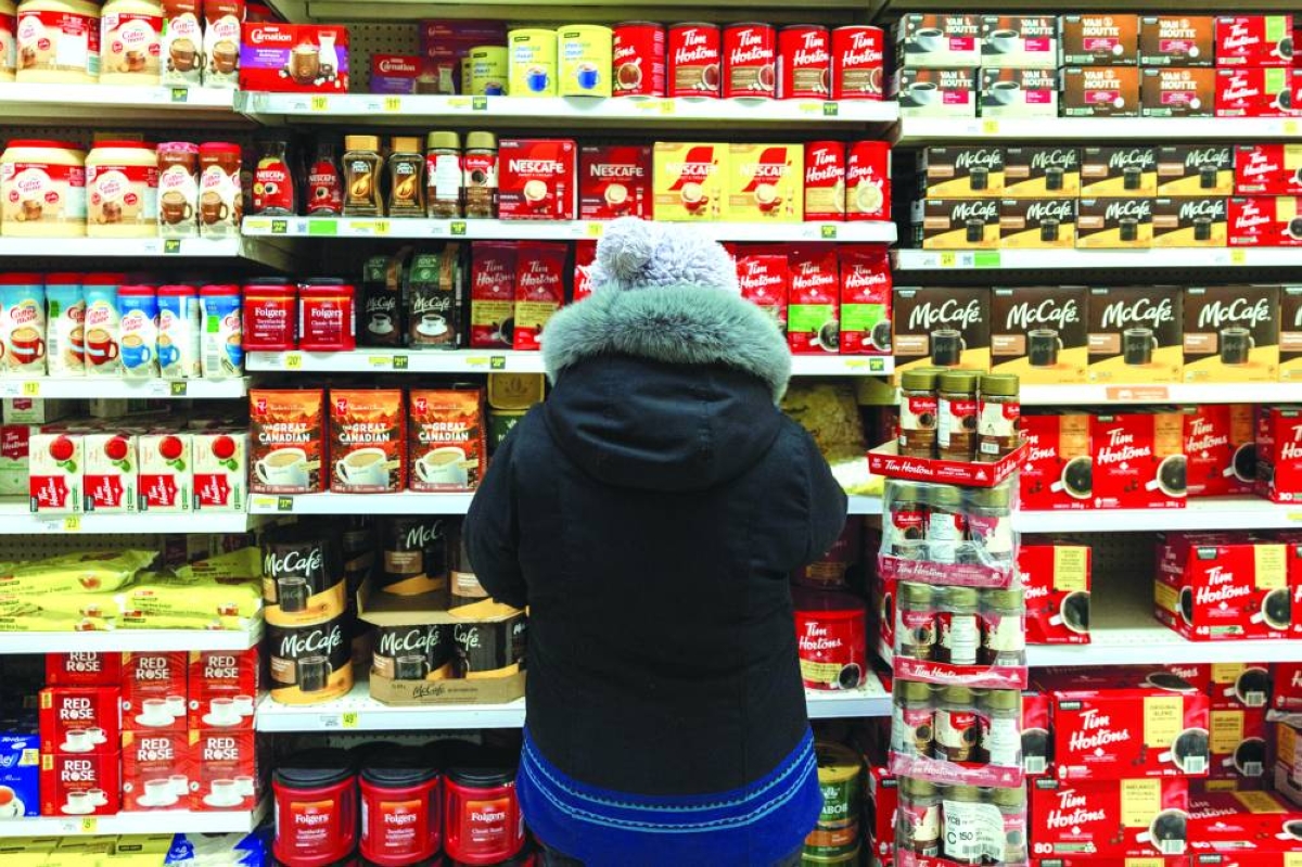 
A shopper browses the coffee aisle at the Northern store in Cambridge Bay, Nunavut, Canada. ‌Policymakers will only hike rates if they think a surge in energy costs induced by the Iran war will filter ‌into other prices, lifting inflation expectations across the entire economy. (Reuters/File Photo) 