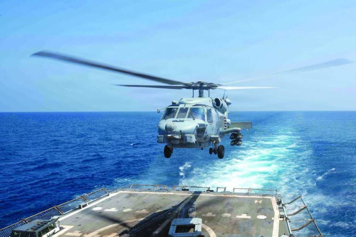 An MH-60R Sea Hawk helicopter, assigned to Helicopter Maritime Strike Squadron 37, takes off from the flight deck of Arleigh Burke-class guided-missile destroyer USS Pinckney for a mission supporting Operation Epic Fury during the Iran war. – Reuters