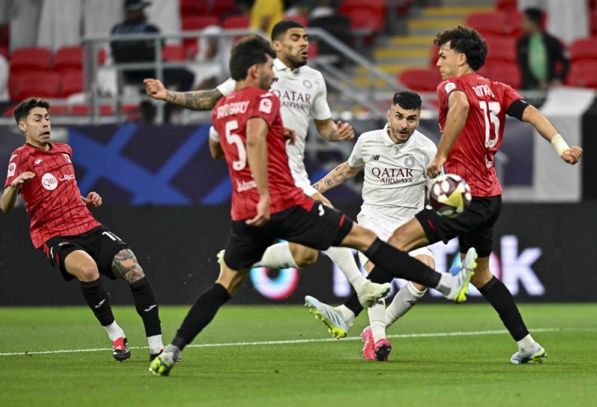 Al Sadd and Al Rayyan players battle for the ball at the Ahmad Bin Ali Stadium. PICTURES: Noushad Thekkayil