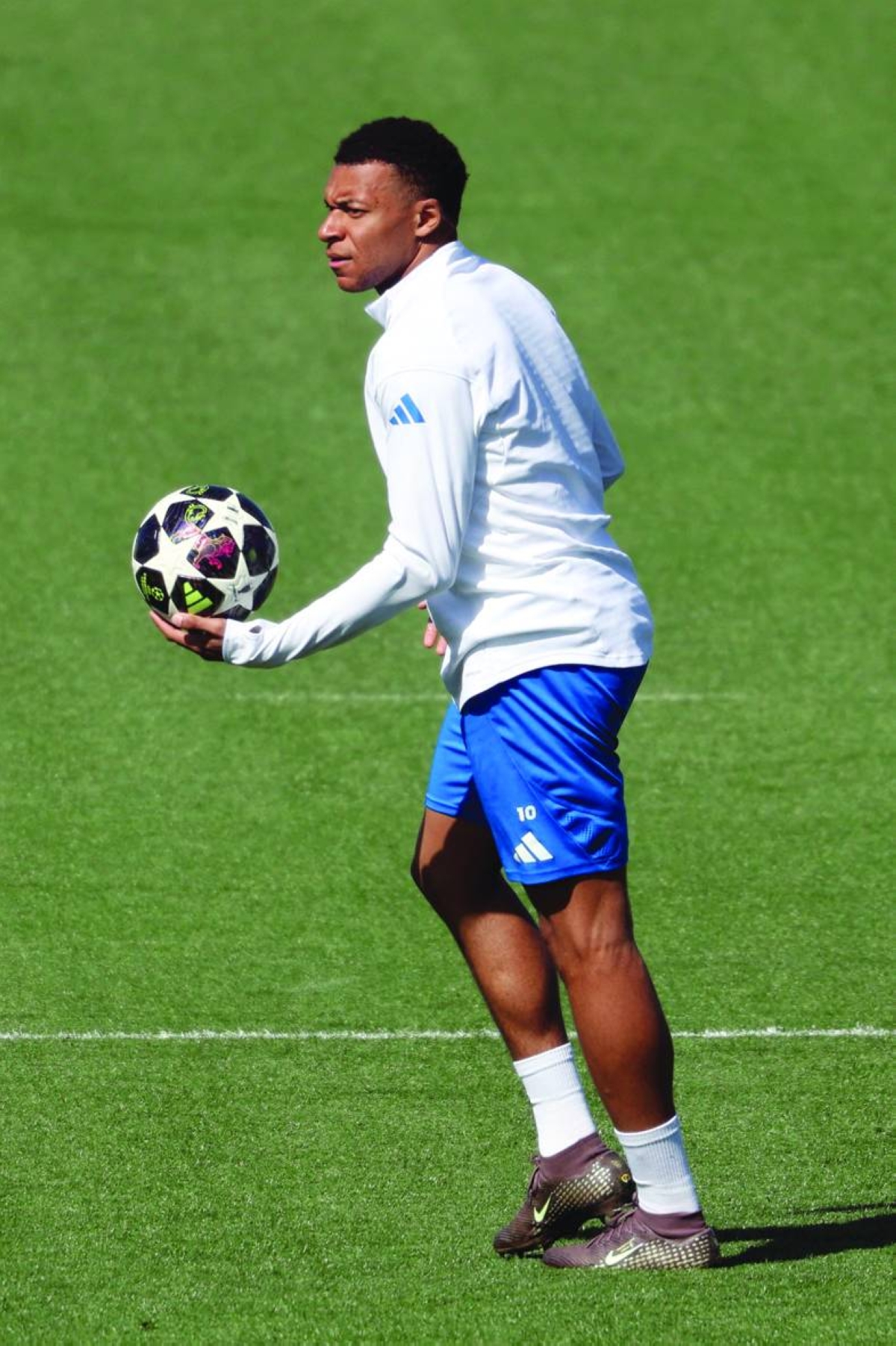 Real Madrid's French forward #10 Kylian Mbappe attends a training session on the eve of the UEFA Champions League quarter final first leg football match against FC Bayern Munich, at Real Madrid Sports City in Valdebebas, in the outskirts of Madrid on April 6, 2026. (Photo by Pierre-Philippe MARCOU / AFP)