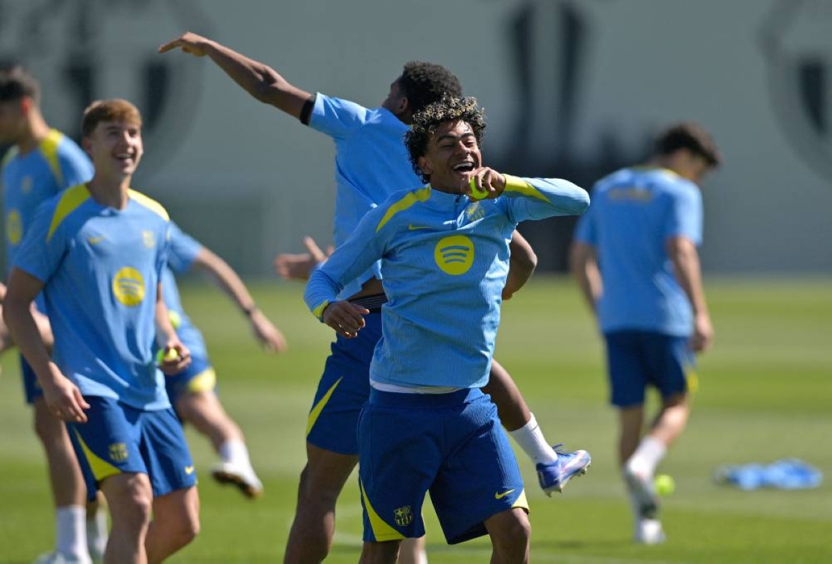 Barcelona's Spanish forward #10 Lamine Yamal attends a training session on the eve of their UEFA Champions League quarter final football match against Club Atletico de Madrid at the Joan Gamper training ground in Sant Joan Despi, near Barcelona, on April 7, 2026. (AFP)