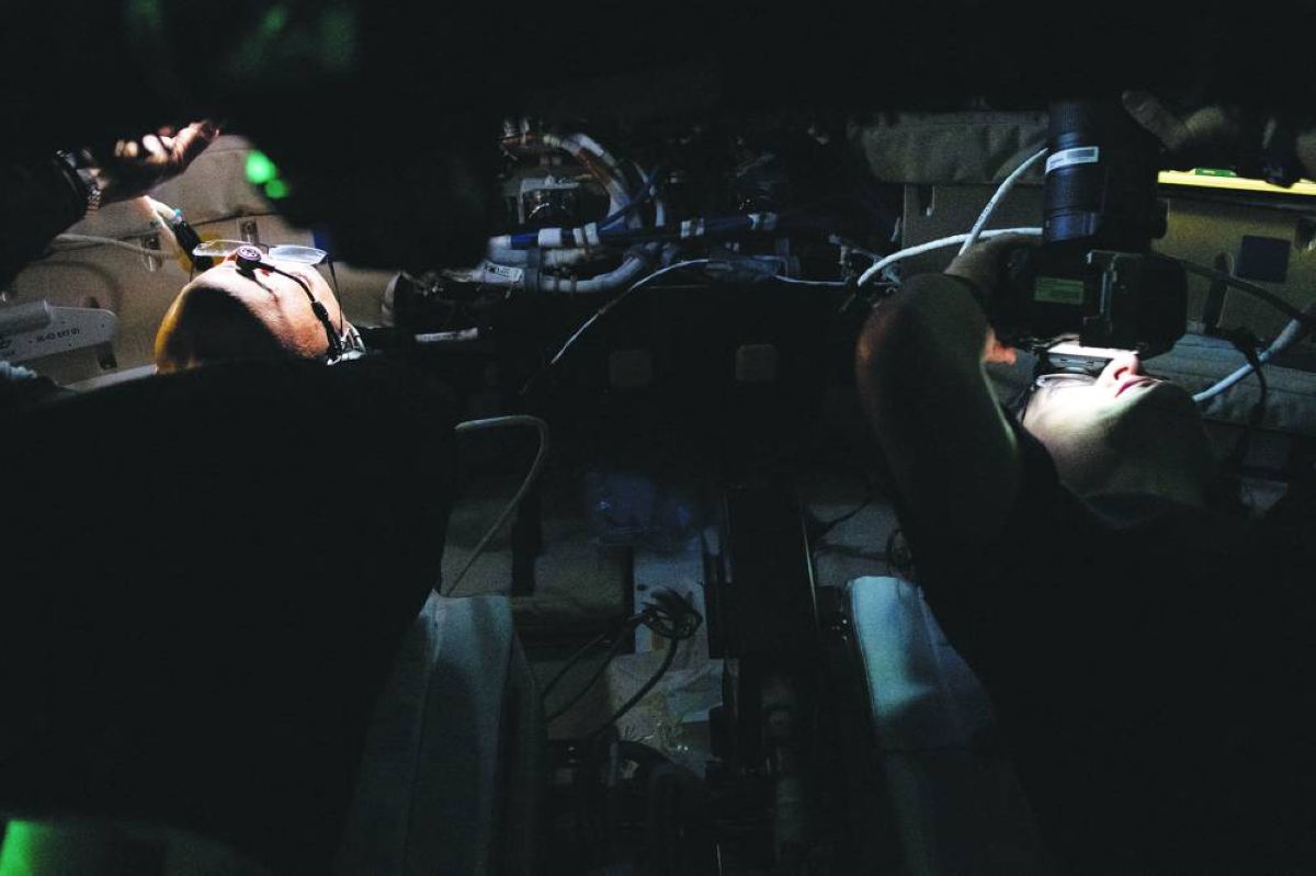 Nasa astronauts Victor Glover and Christina Koch gather images and observations during the Artemis II crew’s flyby of the Moon. Reuters