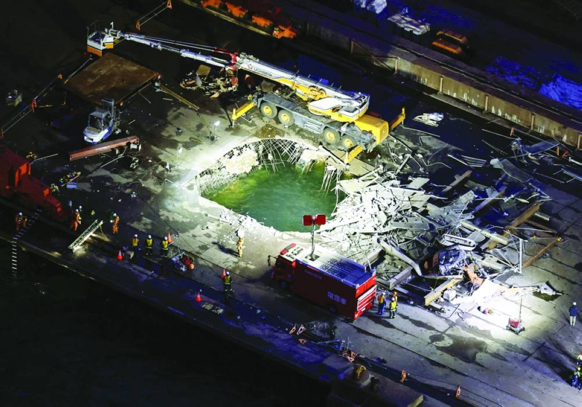 An aerial view of the site where three people were seriously injured and one is missing after falling about 40 metres from collapsed scaffolding at JFE Steel construction site in Kawasaki, south of Tokyo, Tuesday. Reuters