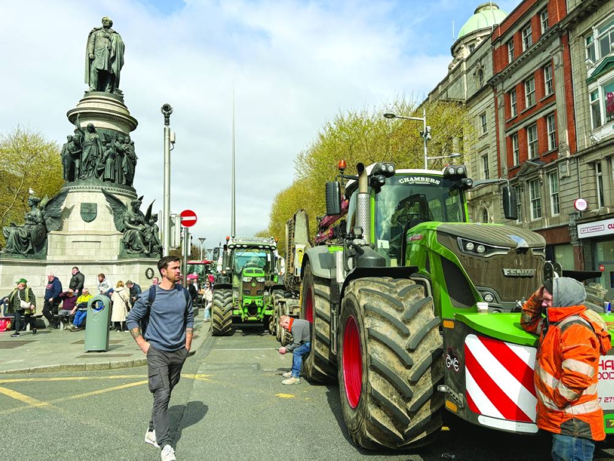 Tractors block Dublin's O'Connell Street, as part of a protest over the high cost of fuel that clogged up busy thoroughfares and motorways across Ireland for a second successive day, in Dublin, Wednesday. (Reuters)