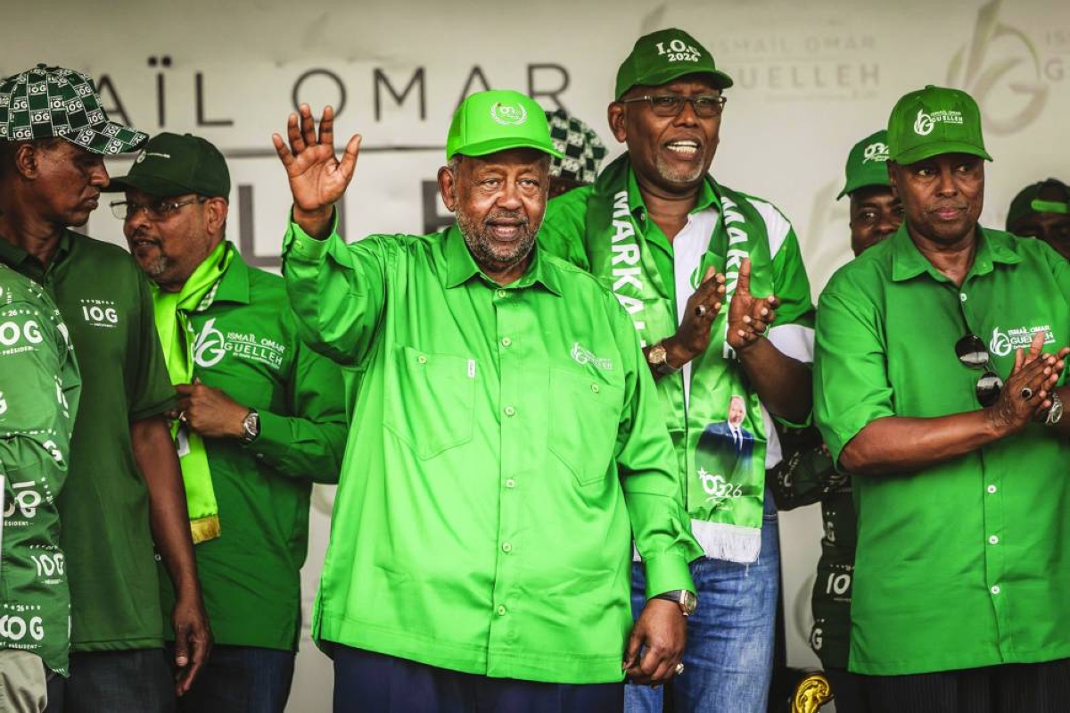 Djibouti’s incumbent president and presidential candidate Ismail Omar Guelleh (centre) waves to supporters at his final campaign rally at Gouled Stadium in Djibouti, Wednesday, ahead of the 2026 Djiboutian presidential elections. (AFP)