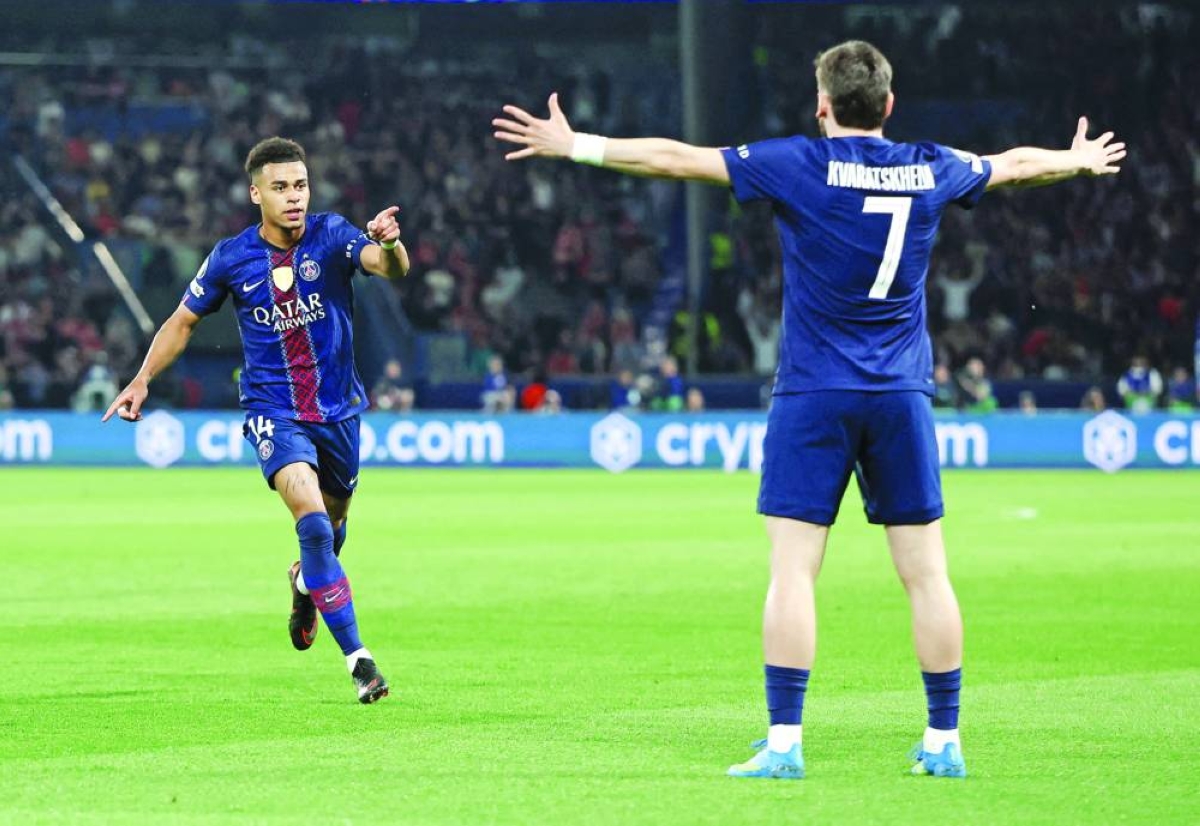 UEFA Champions League - Quarter Final - First Leg - Paris St Germain v Liverpool - Parc des Princes, Paris, France - April 8, 2026
Paris St Germain's Desire Doue celebrates scoring their first goal with Khvicha Kvaratskhelia. REUTERS