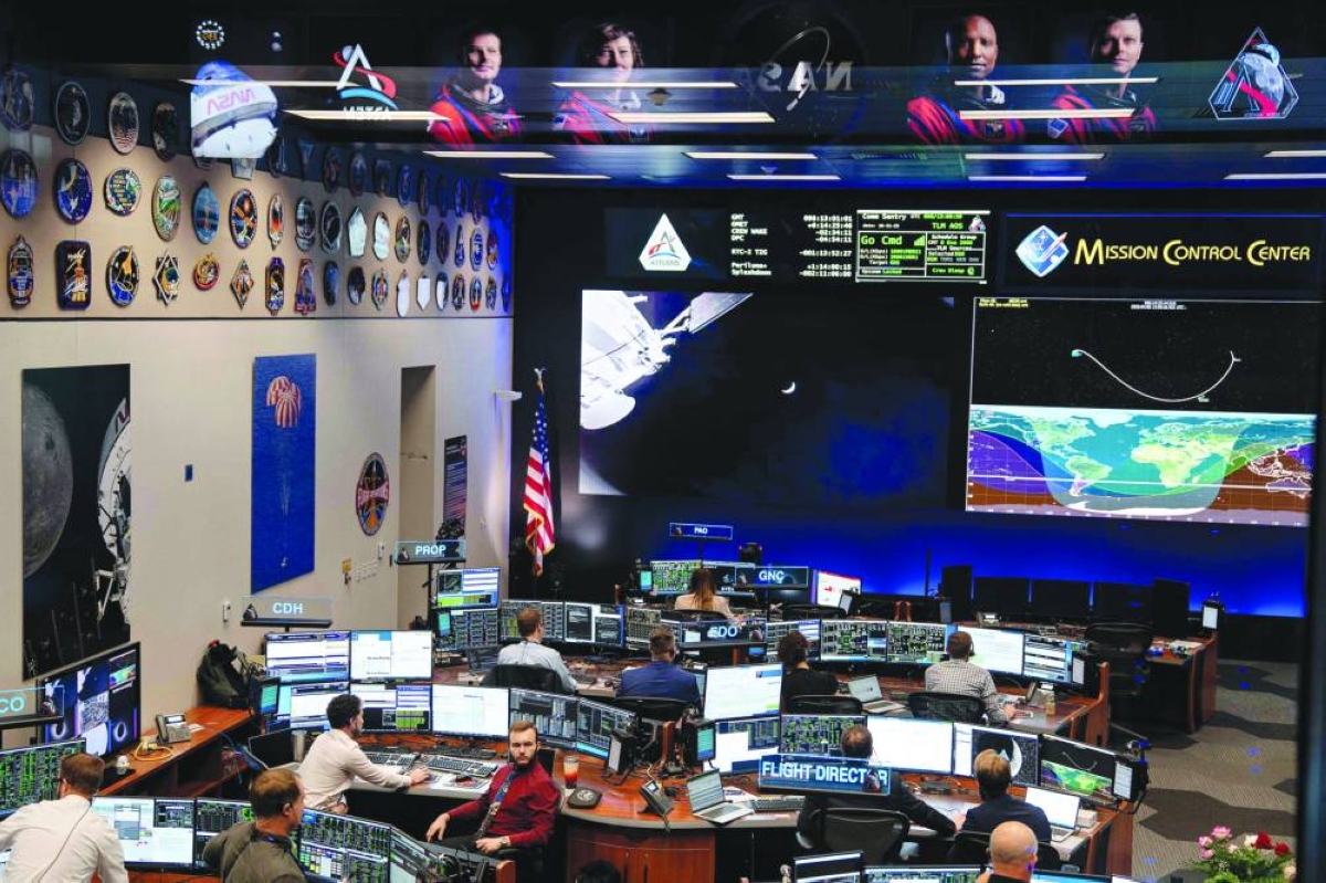 
Flight controllers monitor the Artemis II Orion spacecraft from the White Flight Control Room at the Nasa Johnson Space Center in Houston, Texas. (AFP) 