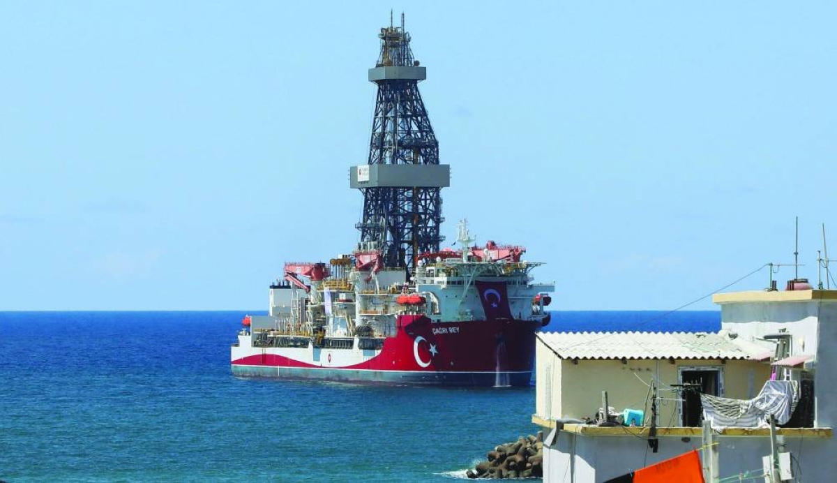 Turkish drilling vessel Cagri Bey, which is set to conduct Turkiye's first deep-sea drilling operation abroad, docks in the Indian Ocean near the Mogadishu sea port in Somalia, yesterday. (Reuters)