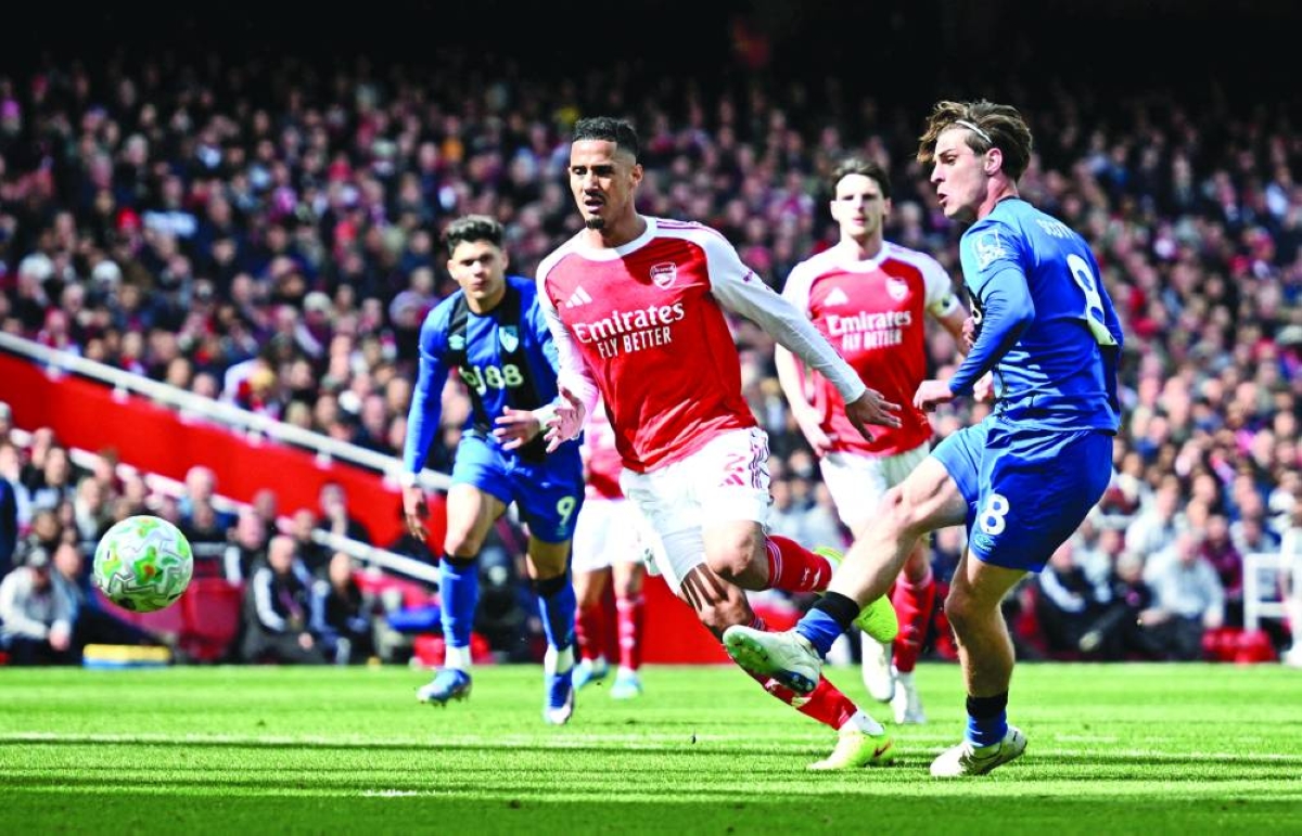 
Bournemouth’s Alex Scott scores against Arsenal at the Emirates Stadium in London. (Reuters) 
