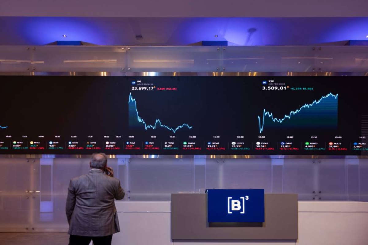 Stock market data displayed at the Brasil Bolsa Balcao (B3) stock exchange in the financial district of Sao Paulo, Brazil (file). Latin American assets have emerged as a haven for emerging-market investors trying to navigate an increasingly volatile global backdrop, buoyed by a roster of oil exporters and greater insulation from tensions in the Middle East.