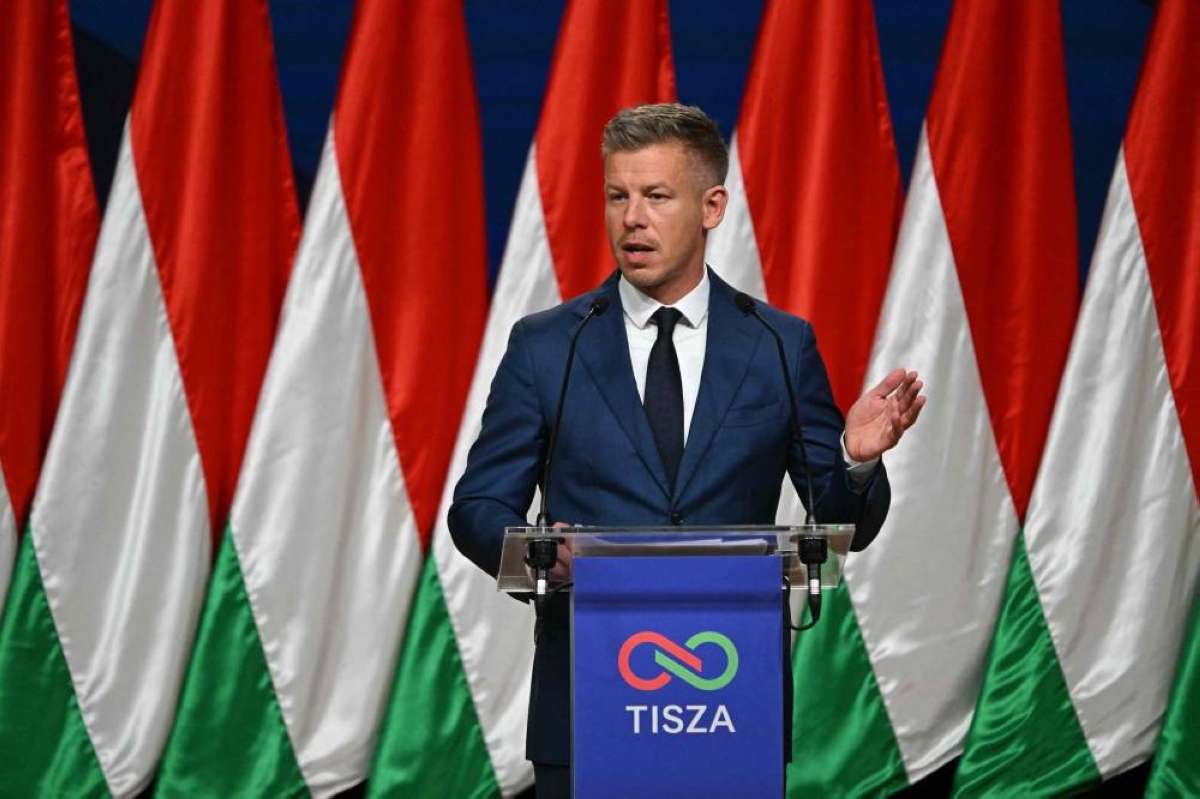 Peter Magyar, leader of the pro-European conservative TISZA party, delivers a press conference at the HUNGEXPO Congress and Exhibition Center in Budapest, yesterday. (AFP)