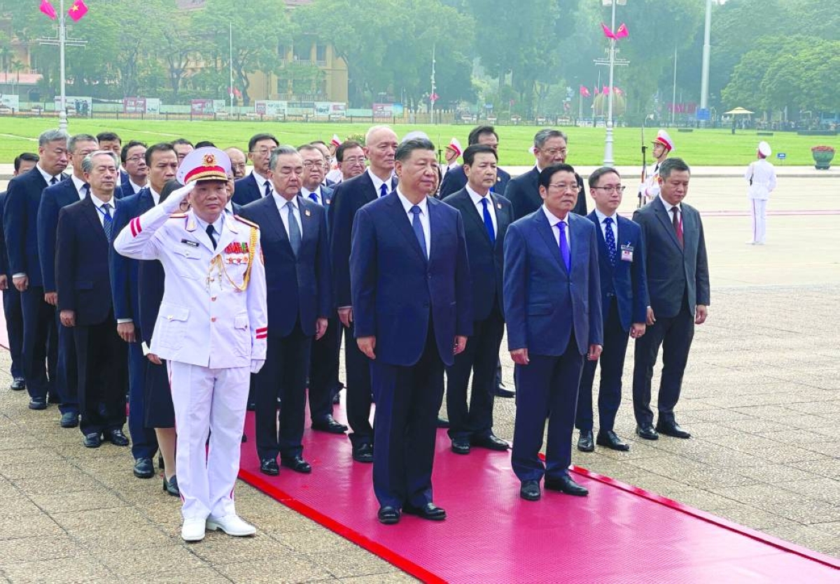 
Chinese President Xi Jinping attends a lay wreath ceremony at the Ho Chi Minh mausoleum during a two day state visit to Hanoi, Vietnam December 13, 2023. (Reuters/File Photo) 