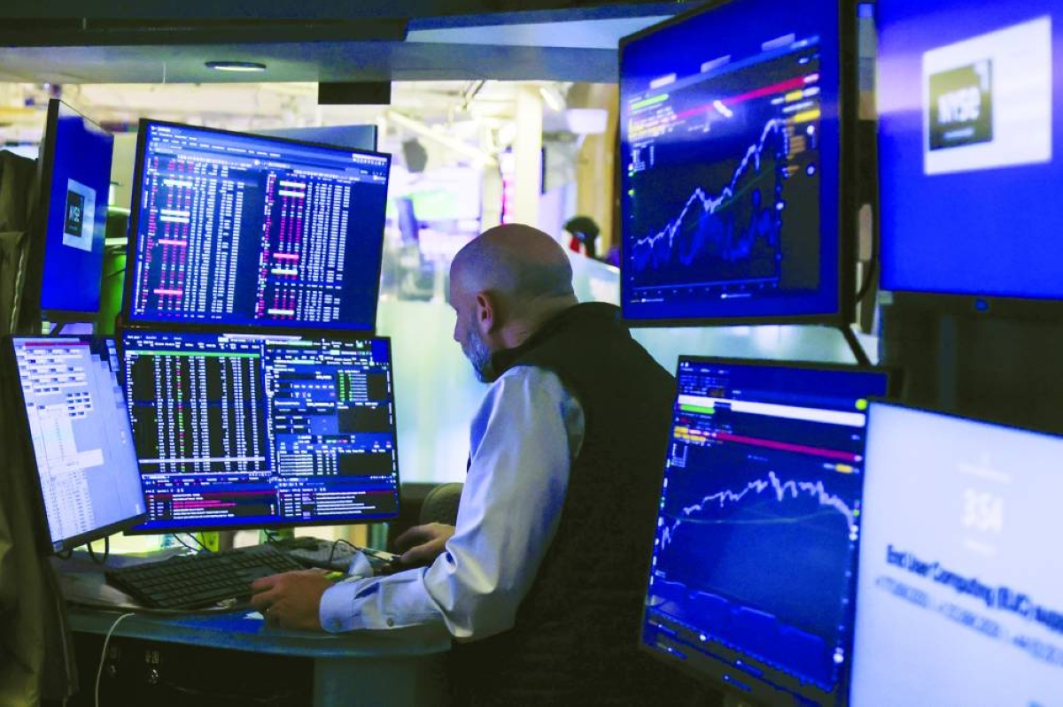 A trader works on the floor at the New York Stock Exchange. Wall Street has gotten repeatedly burned calling a bottom in software stocks, which have been hit hard by fears that artificial intelligence will make the companies obsolete.