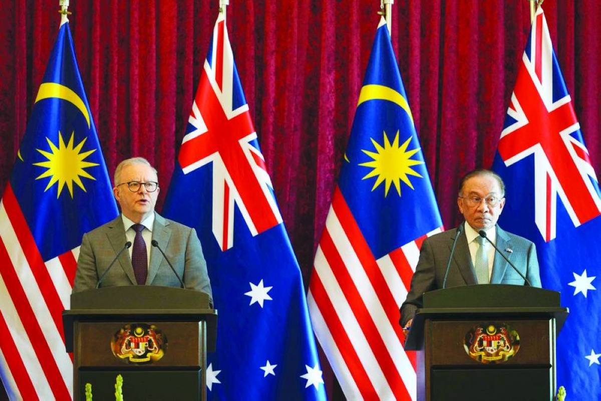 Australia's Prime Minister Anthony Albanese (left) speaks next to Malaysia's Prime Minister Anwar Ibrahim during a press conference in Putrajaya Thursday. (AFP)
