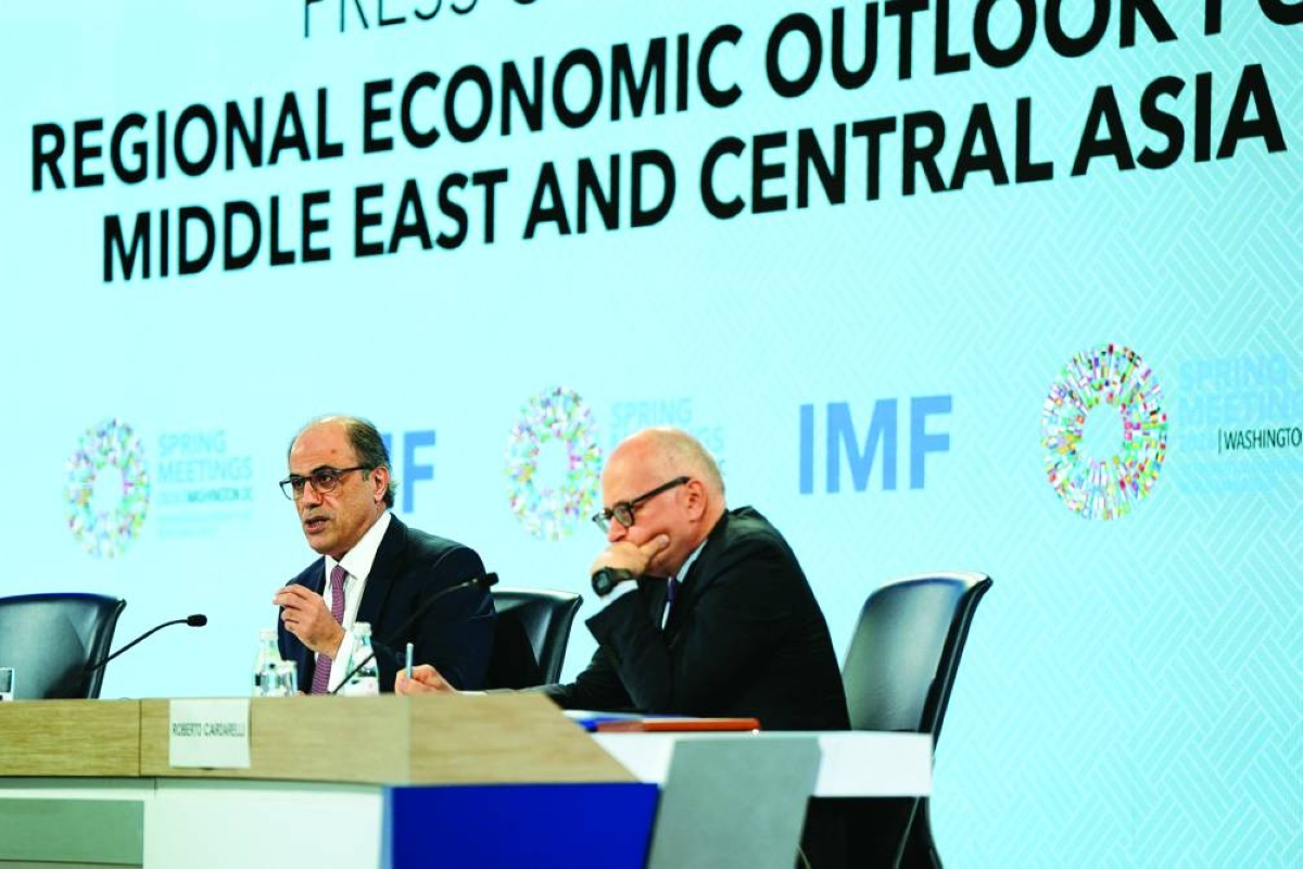 Jihad Azour, Director of the Middle East and Central Asia Department at the International Monetary Fund (left) and IMF official Roberto Cardarelli attend a press conference at the IMF/World Bank 2026 Spring Meetings in Washington, DC, on Thursday.