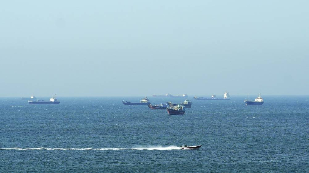 Ships and tankers in the Strait of Hormuz off the coast of Musandam, Oman, Saturday. (Reuters)