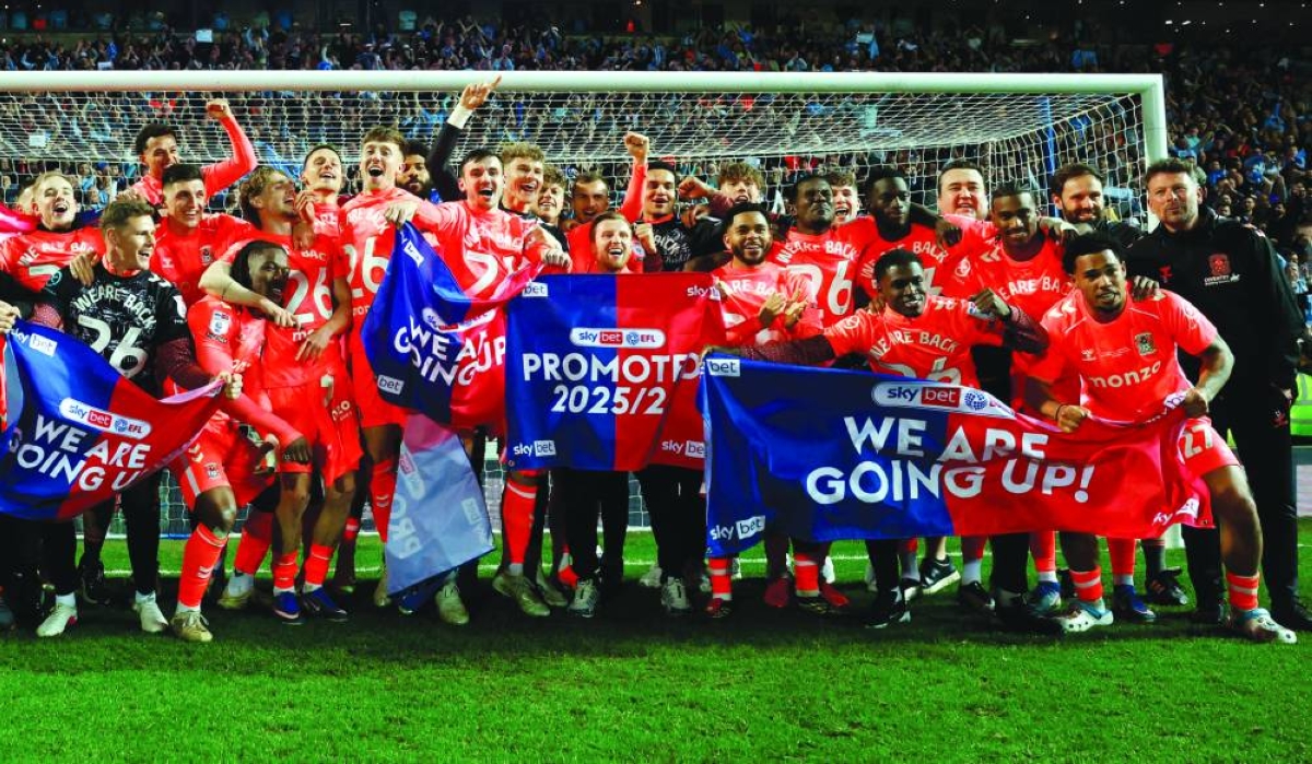 Blackburn Rovers v Coventry City - Ewood Park, Blackburn, Britain - April 17, 2026
Coventry City celebrate after winning promotion to the Premier League Action. Reuters