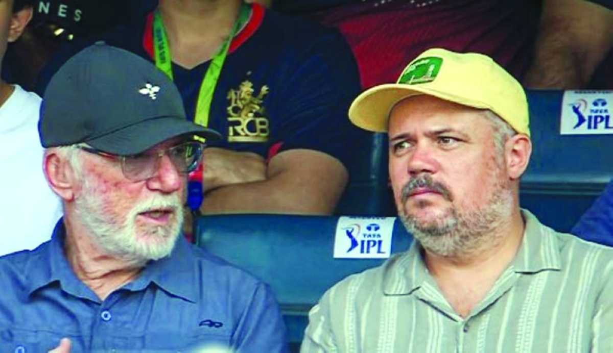Former Australian Test great and captain Allan Border watches the IPL match with his son in Hyderabad Saturday. Border, who played 156 Tests, captained Australia to World Cup glory in 1987.