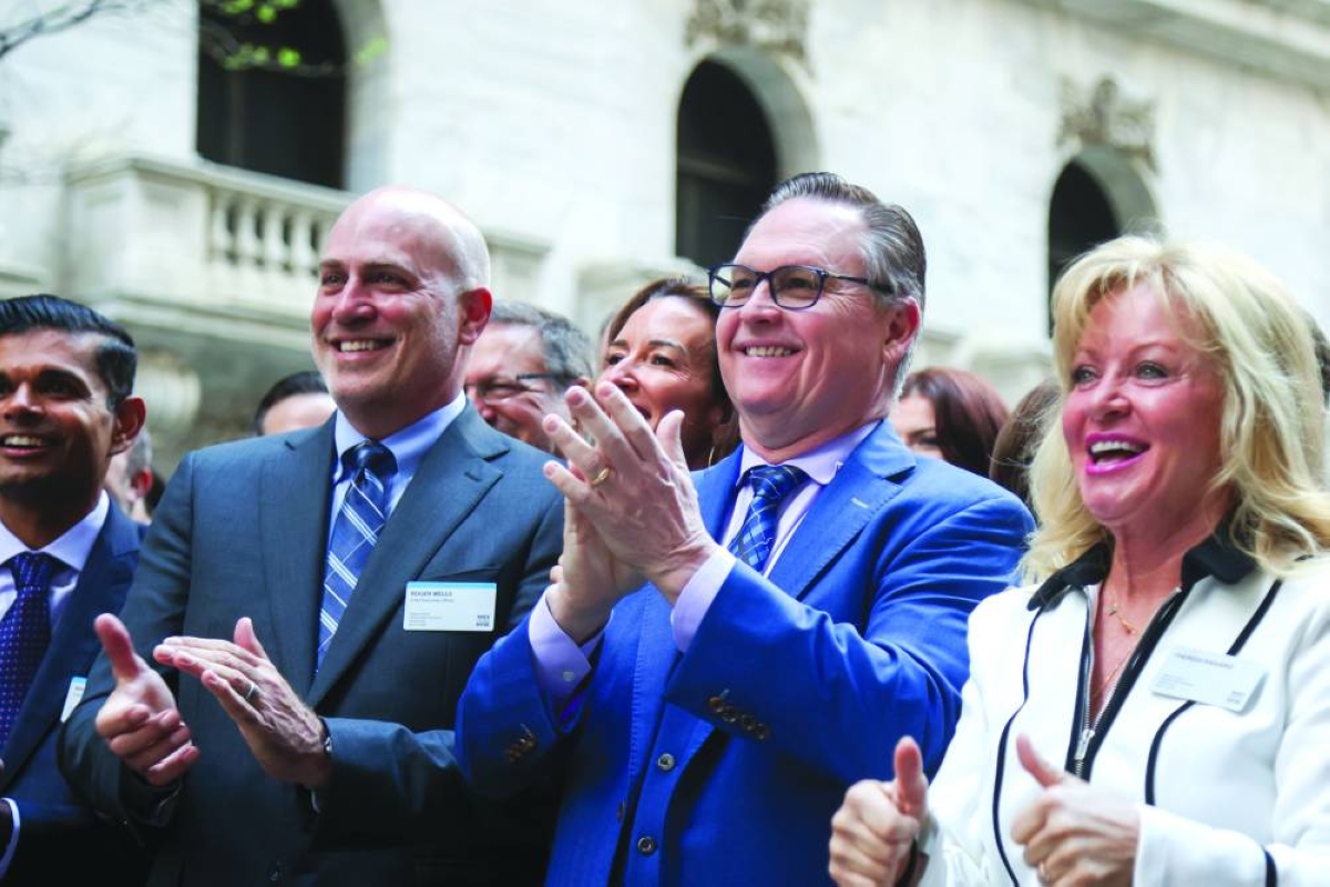 
Aevex CEO Roger Wells, centre left, and founder Brian Raduenz, centre right, at the New York Stock Exchange on April 17. Aevex Corp shares rose 35% after the maker of military drones raised $320mn in a US initial public offering. 