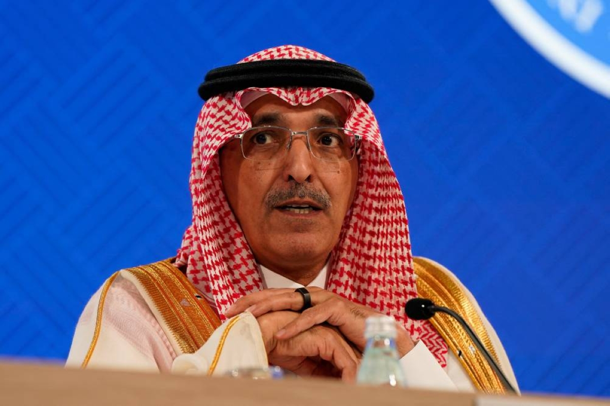 International Monetary and Financial Committee (IMFC) Chair and Saudi Arabia's Minister of Finance Mohammed al‑Jadaan speaks during a press briefing at the IMF/World Bank 2026 Spring Meetings in Washington, DC, on Friday.
