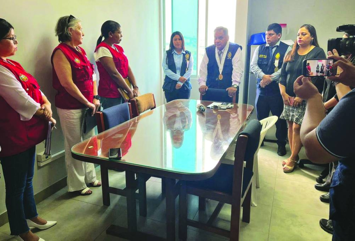 
Prosecutors raiding a warehouse where the ONPE (National Organisation of Electoral Processes) stores electoral material in Lurin, south of Lima. (AFP) 