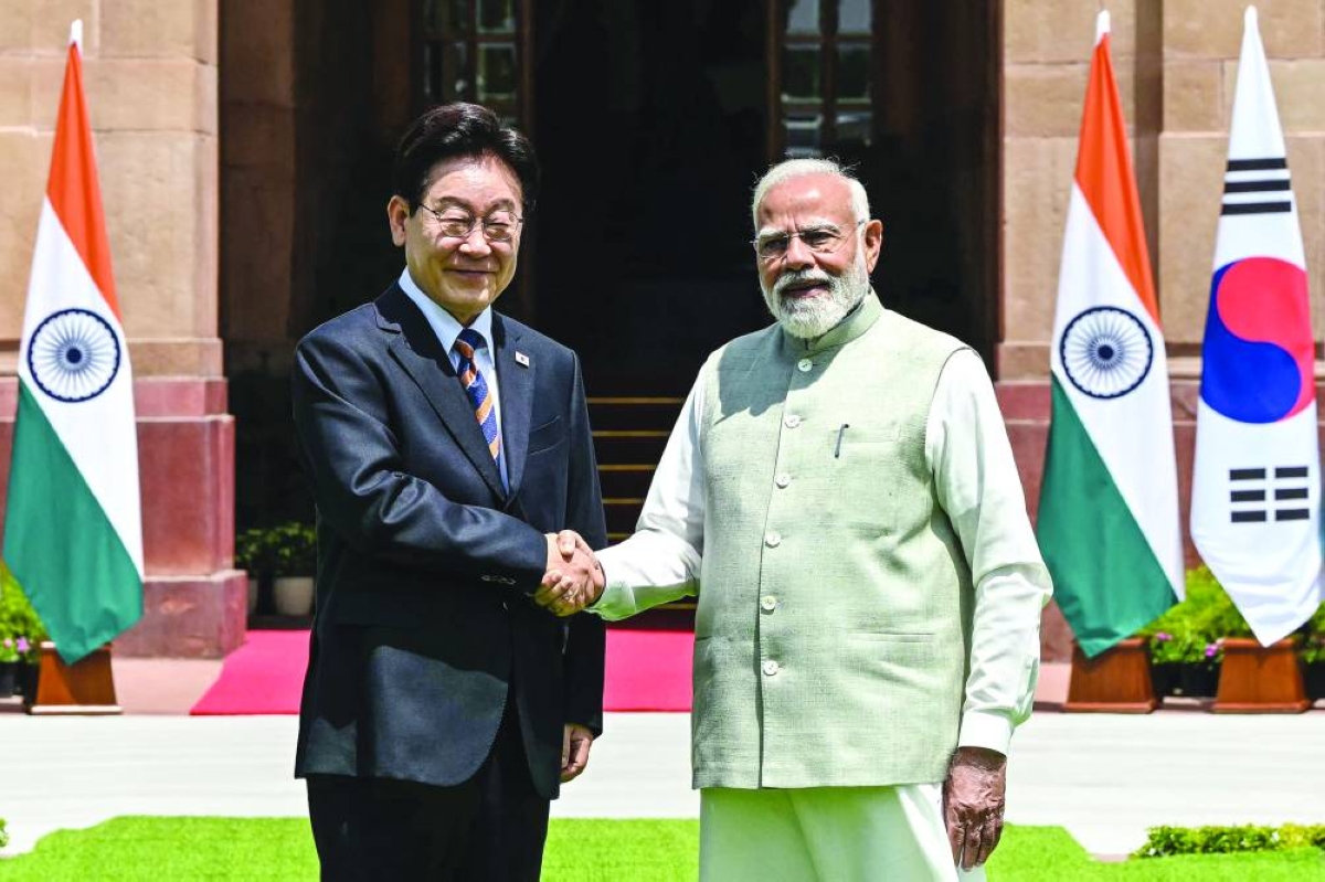 
India’s Prime Minister Narendra Modi (right) shakes hands with South Korea’s President Lee Jae Myung before their meeting in New Delhi on Monday. 