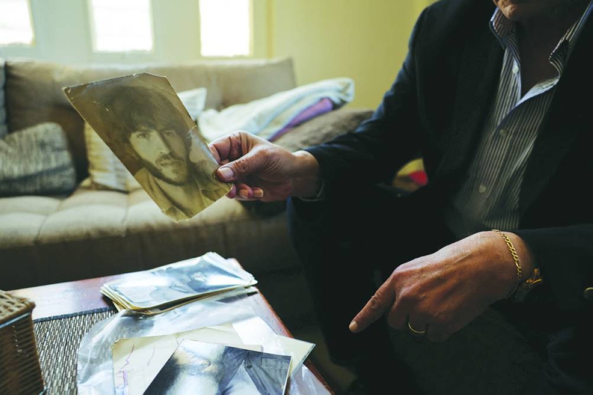 Head of the Lebanese NGO Fighters for Peace Ziad Saab shows a portrait that he took of himself during the Lebanese civil war, in his home in Beirut, Lebanon April 14, 2026. REUTERS