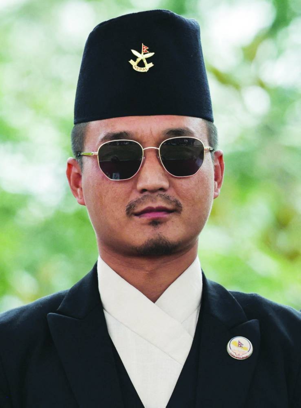 Newly appointed Home Minister Sudan Gurung poses for a picture after taking oath at "Shital Niwas", the presidential building in Kathmandu. (Reuters/File Photo)