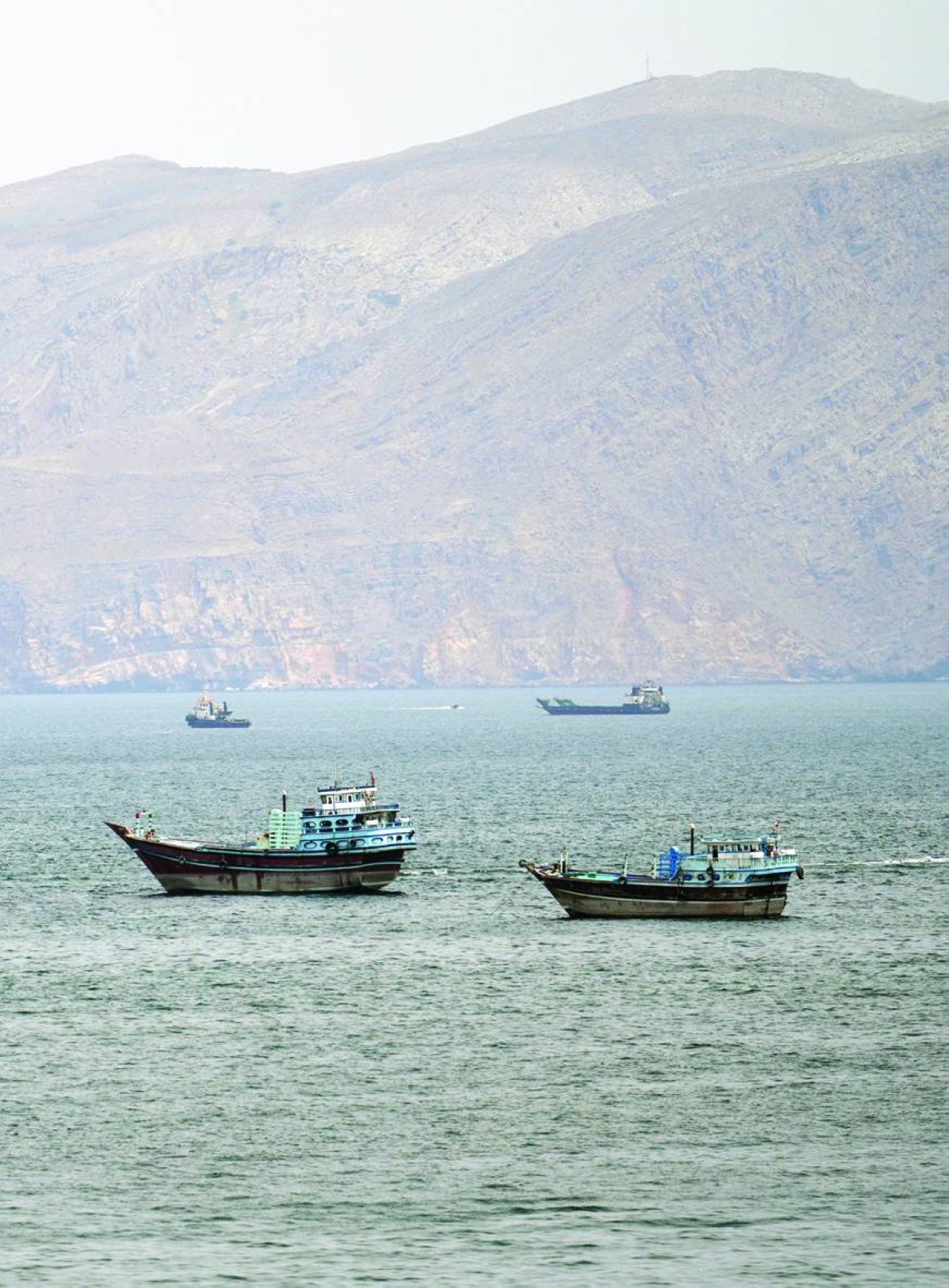 Ships and boats in the Strait of Hormuz, Musandam, Oman, Wednesday. (Reuters)