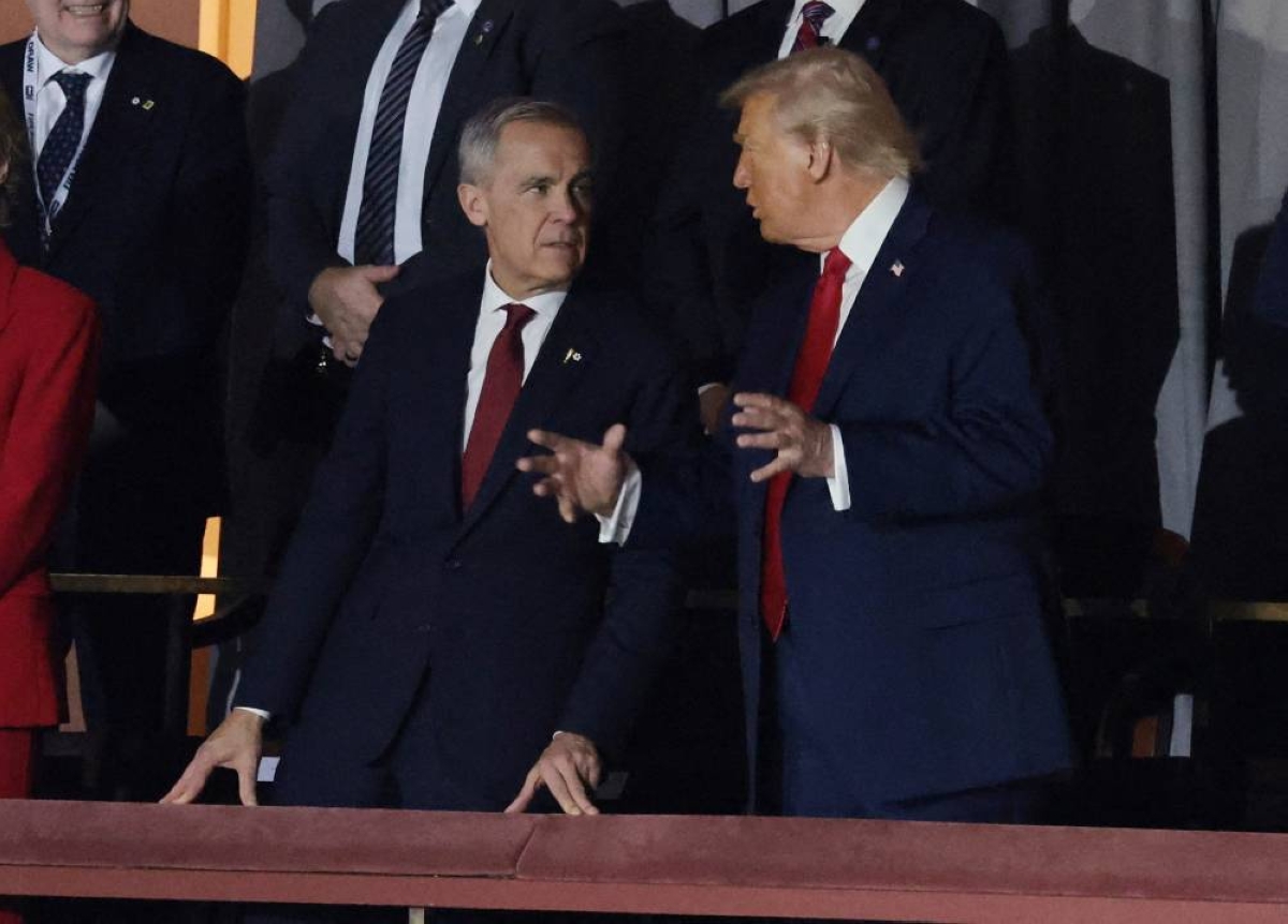 FILE PHOTO: Soccer Football - FIFA World Cup 2026 - FIFA World Cup 2026 Draw - John F. Kennedy Center for the Performing Arts, Washington, D.C., U.S. - December 5, 2025
Canada's Prime Minister Mark Carney and U.S. President Donald Trump during the FIFA World Cup 2026 Draw REUTERS/Jonathan Ernst/File Photo