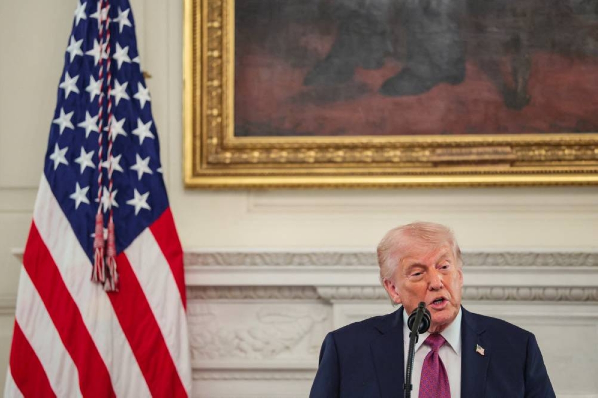 U.S. President Donald Trump delivers remarks to NCAA Collegiate National Champions in the State Dining Room at the White House in Washington, D.C., U.S., April 21, 2026. REUTERS/Kylie Cooper