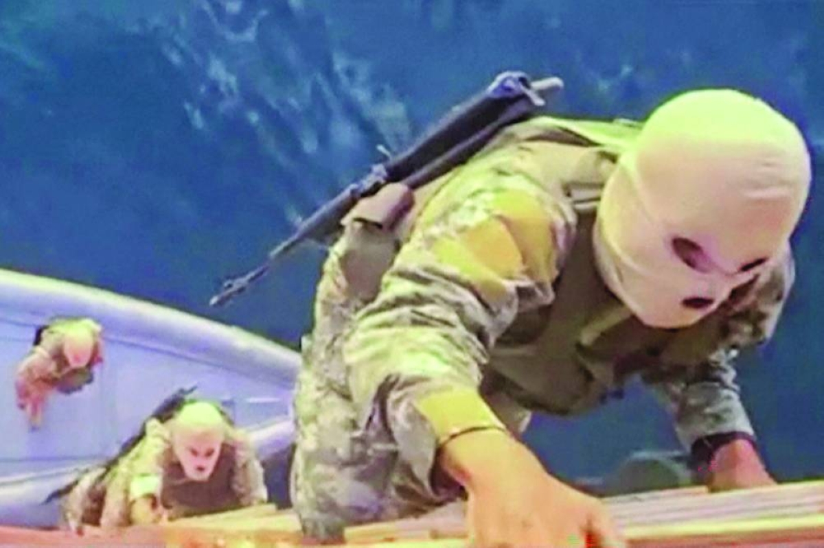 This screen grab taken from undated video footage released by IRGC shows naval forces allegedly boarding a ship attempting to cross the Strait of Hormuz. (AFP)