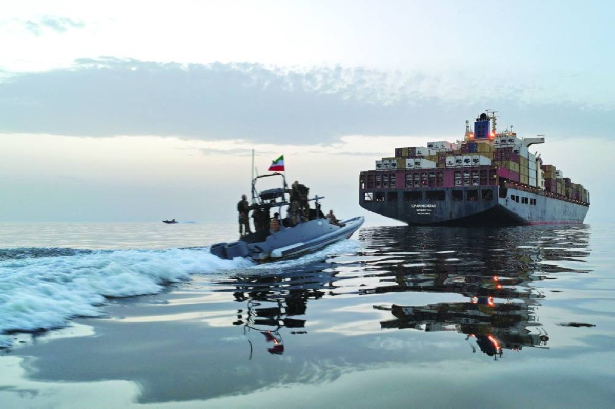 This photo obtained by AFP from the Iranian news agency Tasnim shows an Islamic Revolutionary Guard Corps (IRGC) boat allegedly taking part in an operation to seize ships attempting to cross the Strait of Hormuz. – AFP
