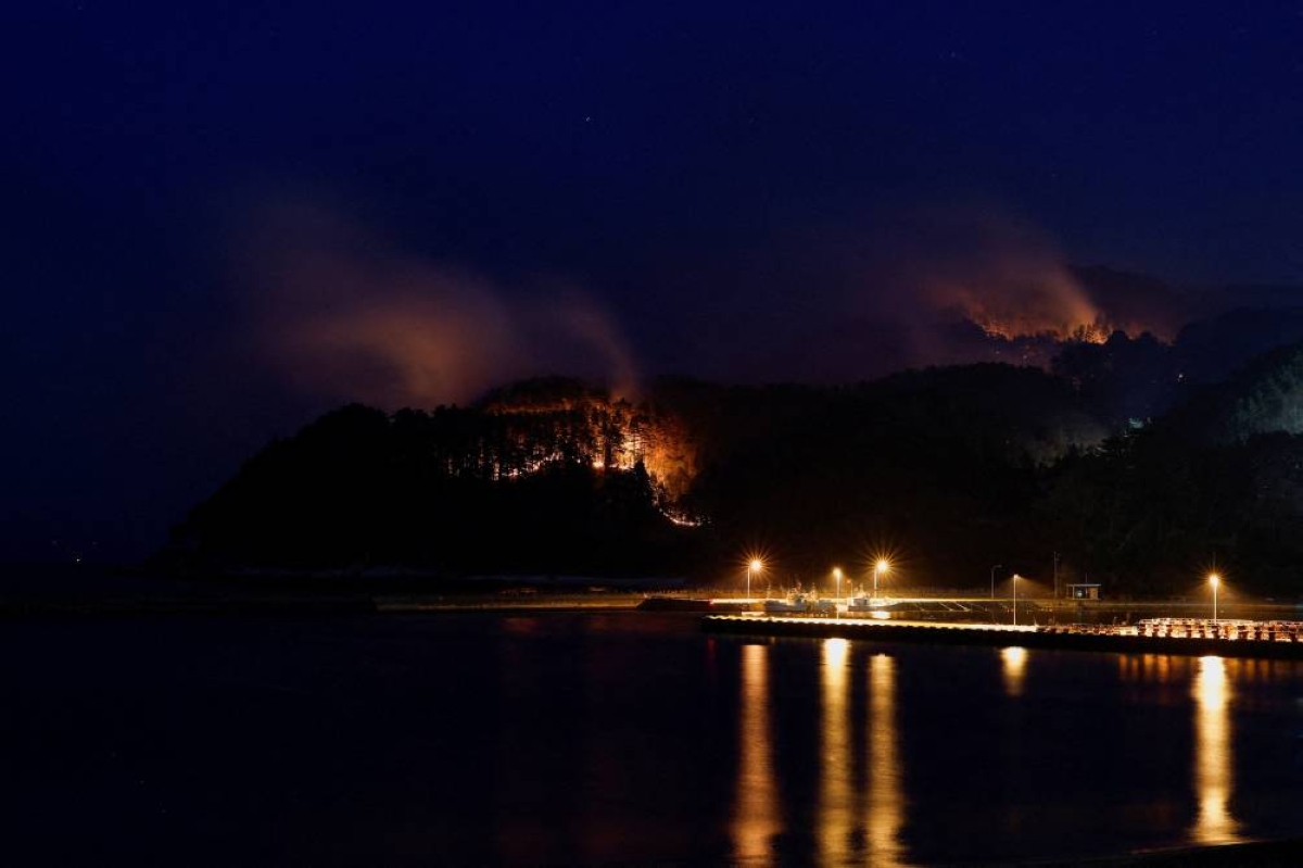 Smoke rises in forest areas as wildfires continue in Otsuchi, Iwate Prefecture, Japan, Saturday.(Reuters)