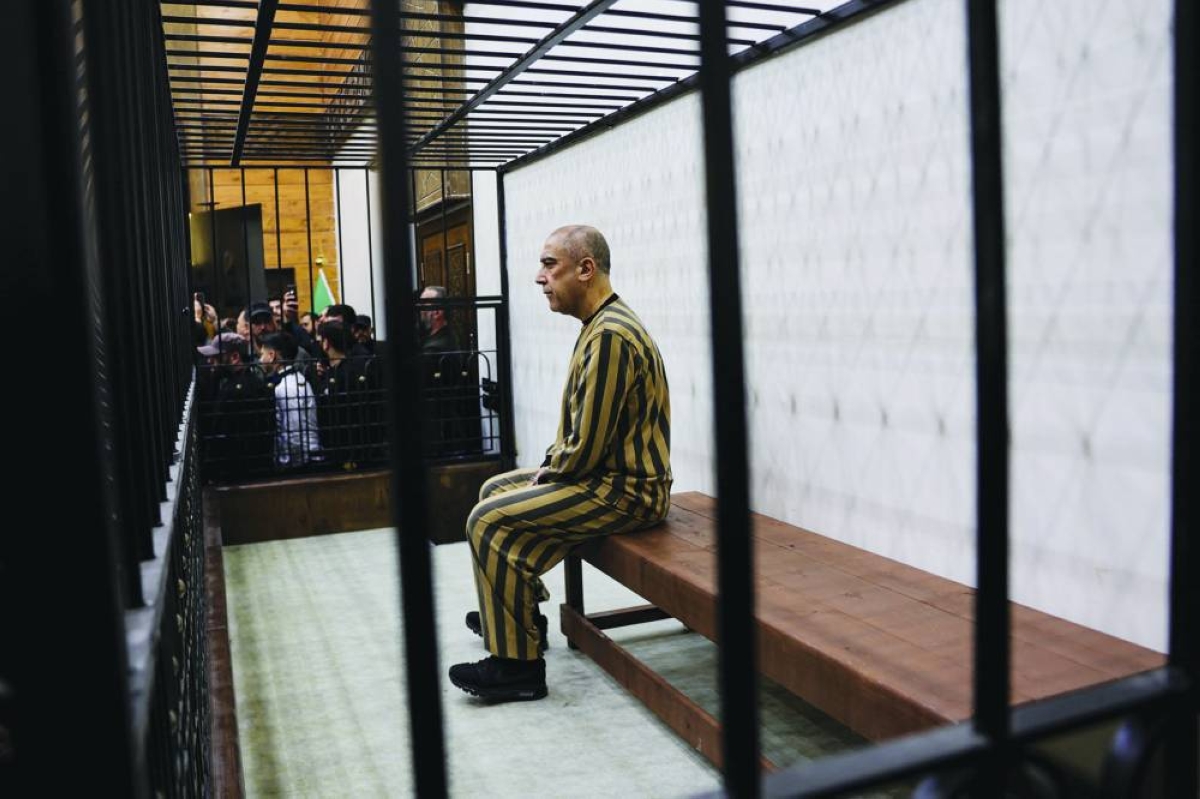 Atef Najib, a brigadier general and former head of the Political Security Department in Daraa during Syria's ousted President Bashar al-Assad's rule, who is accused of committing war crimes, attends a trial session at the Palace of Justice, in Damascus, Syria, April 26, 2026. REUTERS